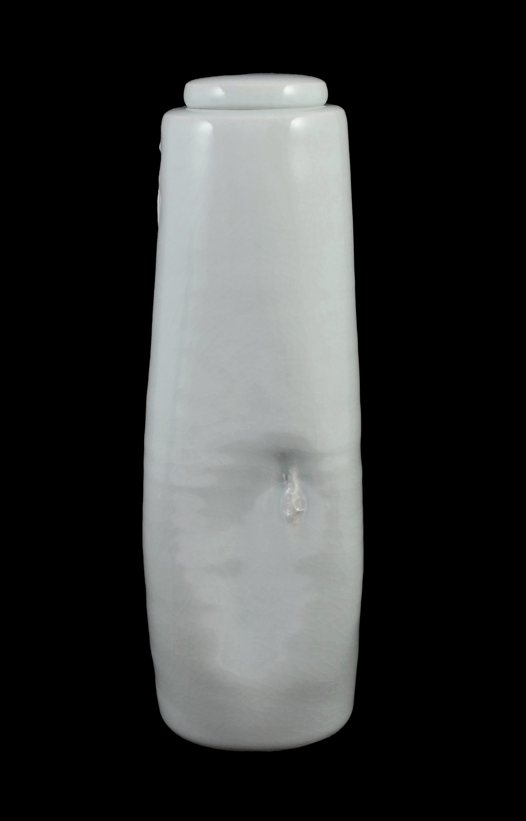 Edmund de Waal (b.1964) a tall dimpled porcelain lidded vase, c.1993, 28.5 cm high